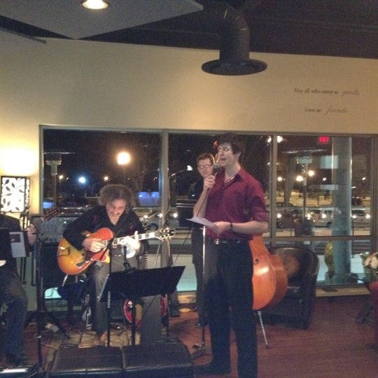 Photo taken at 4 Sisters Wine Bar &amp; Tapas by Traci W. on 2/20/2012