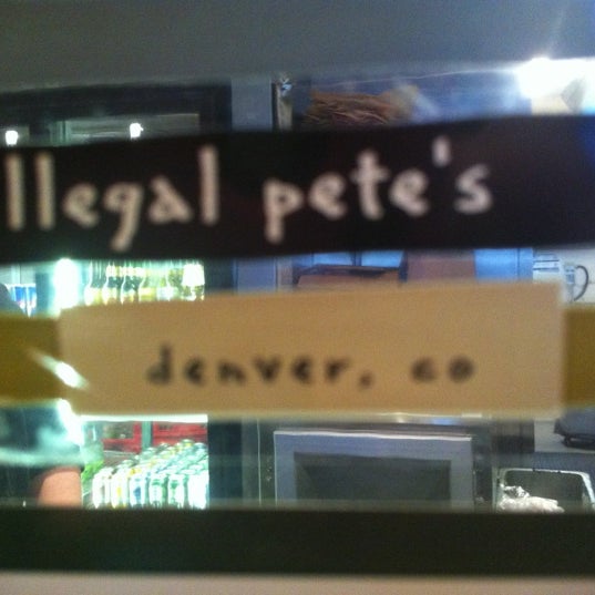 Photo taken at Illegal Pete&#39;s by Tyleen S. on 4/20/2012