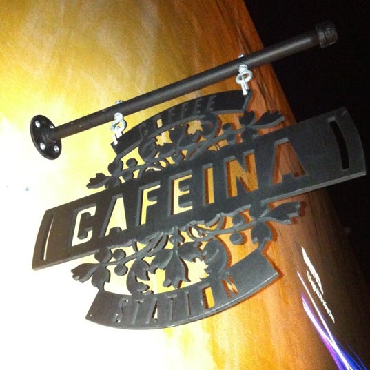Photo taken at Cafeina Lounge by Luz S. on 5/13/2012