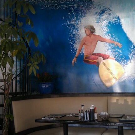 Photo taken at The Longboarder Cafe by Jonathan S. on 3/8/2012
