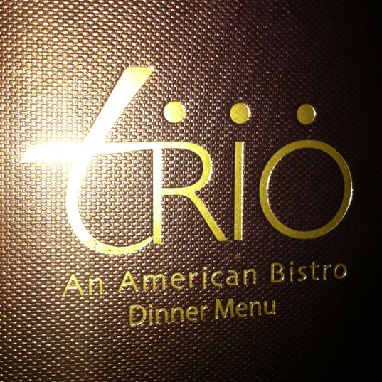Photo taken at Trio An American Bistro by Jessica W. on 4/10/2012