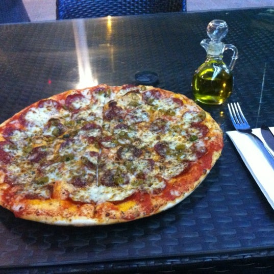 Photo taken at PizzaExpress by Ahmed B. on 5/3/2012