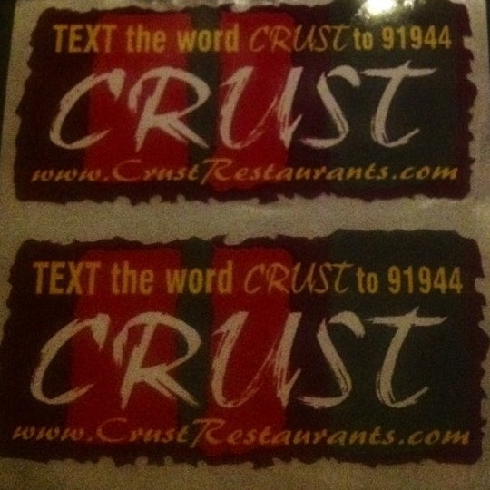 Photo taken at Crust Pizza &amp; Wine Cafe by Jaime B. on 8/12/2012