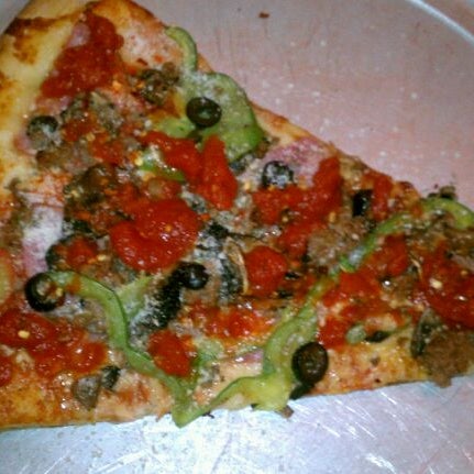 Photo taken at Russo&#39;s New York Pizzeria by Erica L. on 5/19/2012
