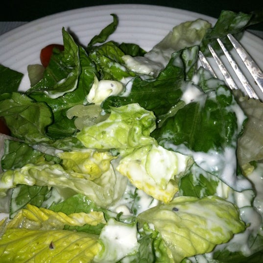 Photo taken at Volare Italian Restaurant by Louise S. on 3/25/2012