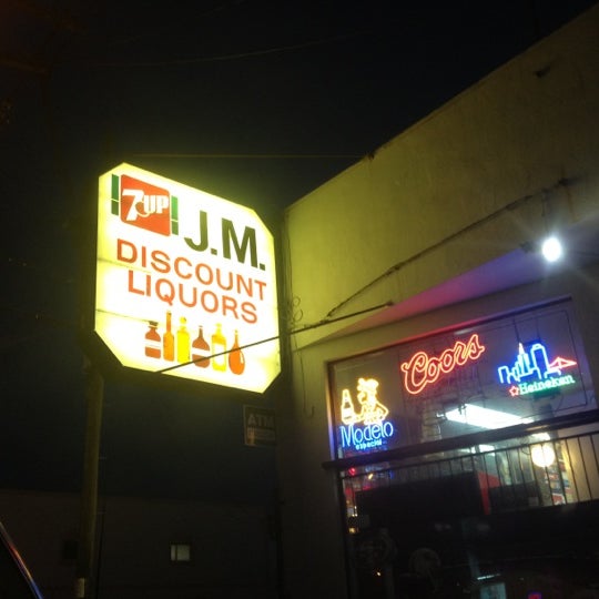 Photo taken at JM Discount Liquor by Angelic E. on 4/30/2012