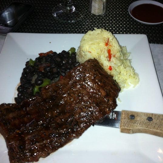 Photo taken at Kone Restaurant by Sam H. on 5/5/2012