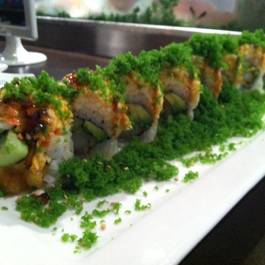 Photo taken at Oops! Sushi &amp; Sake Bar by Brett R. on 6/30/2012