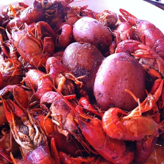 Photo taken at Orleans Seafood Kitchen by Ryan B. on 3/9/2012