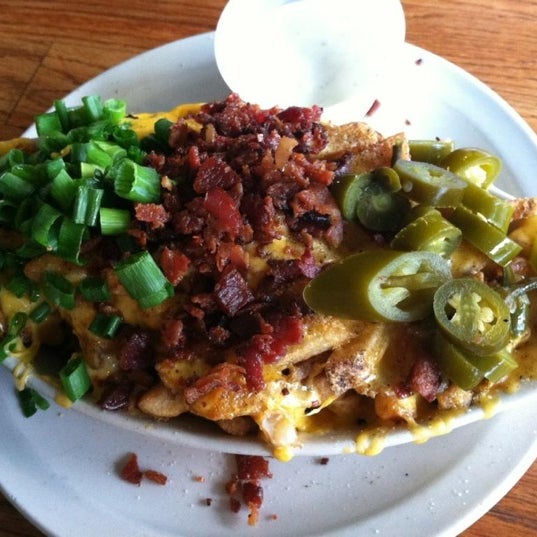 Photo taken at Snuffers by Catherine P. on 2/27/2012