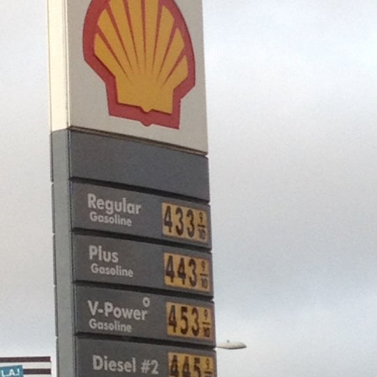 Photo taken at Shell by Christina S. on 3/25/2012