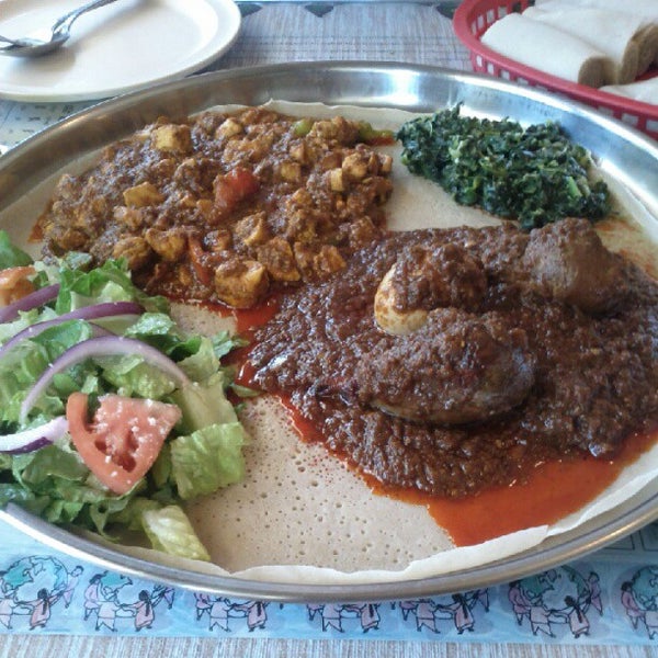 Photo taken at Queen Sheba Ethopian Restaurant by marsh w. on 7/24/2012