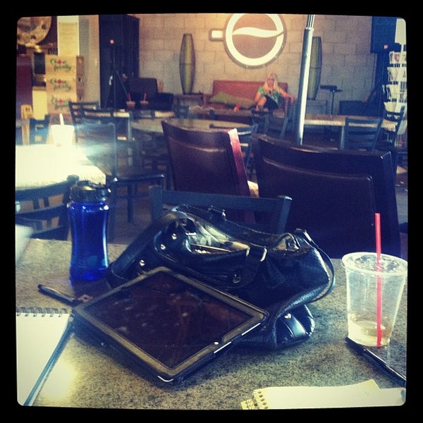 Photo taken at Elevate Coffee Company by Denisse L. on 6/18/2012