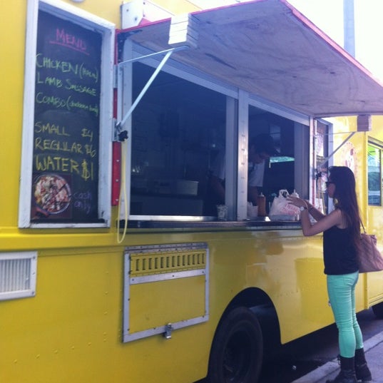 Photo taken at The Chicken &amp; Rice Guys by Jenny C. on 6/29/2012