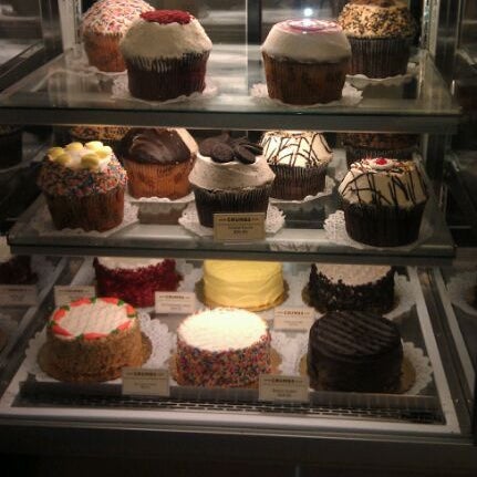 Photo taken at Crumbs Bake Shop by Erin C. on 5/1/2012
