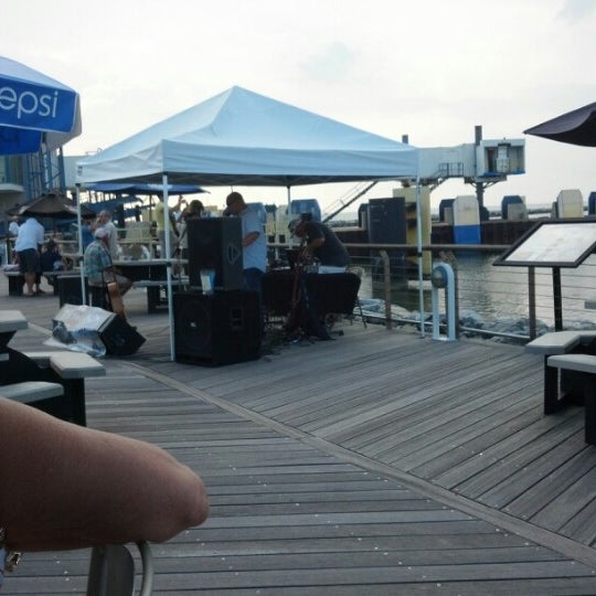 Photo taken at On The Rocks Bar and Grill by Tanya R. on 8/2/2012