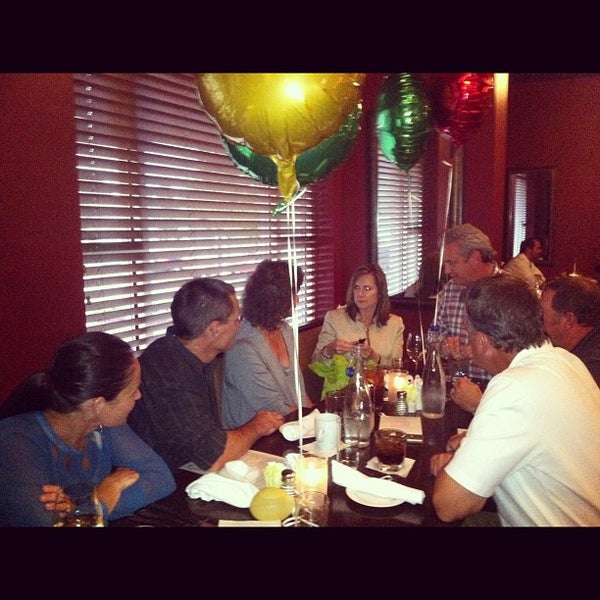 Photo taken at Table 100 by Ellie B. on 7/19/2012