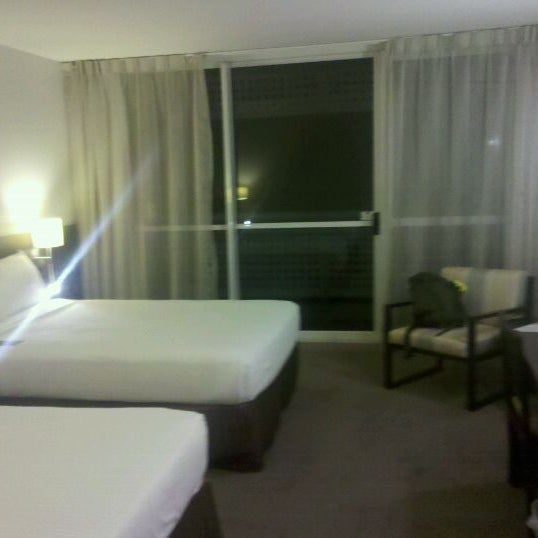 Photo taken at Holiday Inn Cairns Harbourside by Becky on 5/24/2012