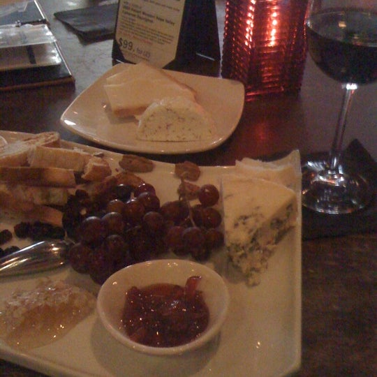 Photo taken at Vines Grille &amp; Wine Bar by Laura D. on 8/2/2012