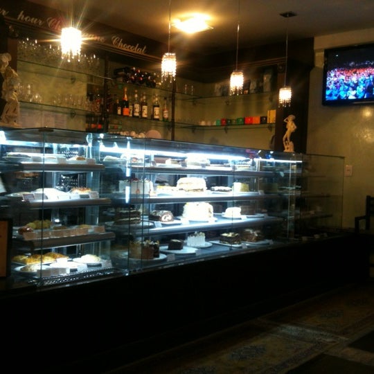 Photo taken at Champagne Chocolat Cafeteria &amp; Doceria by Marco M. on 6/10/2012