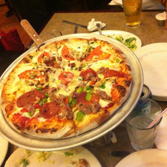 Photo taken at North Beach Pizza by Bindi E. on 8/9/2012