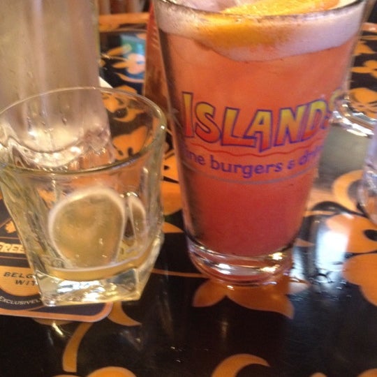 Photo taken at Islands Restaurant by Diana S. on 7/11/2012