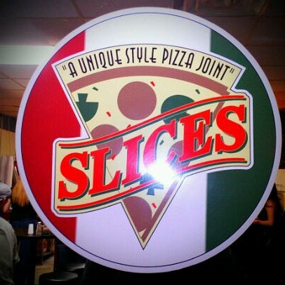 Photo taken at Slices Pizza by Paul G. on 2/19/2012