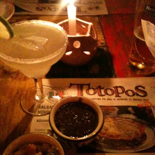 Photo taken at Totopos Gastronomia Mexicana by Cristiane H. on 8/3/2012