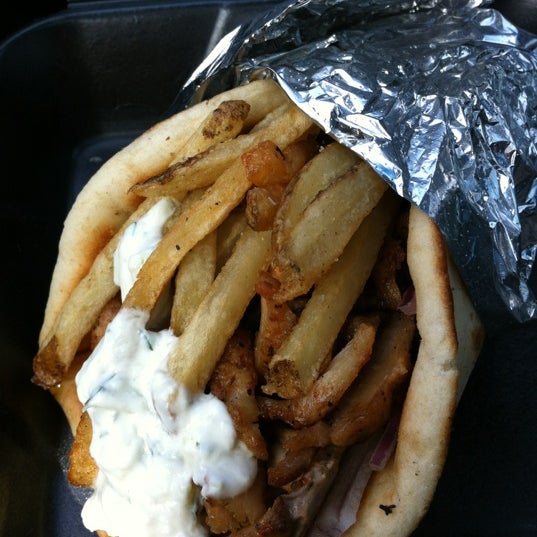 Opai Gyro (pork with tomatoes, onions, tsatziki, and fries on a pita), $8.50. Wow! Really good gyro that is also a great value. You'll love it.