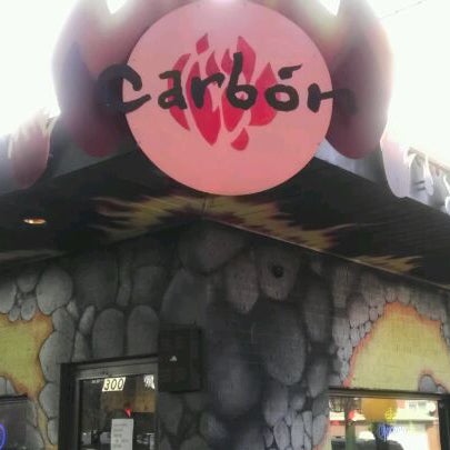 Photo taken at Carbon Live Fire Mexican Grill by Carlos S. on 3/17/2012