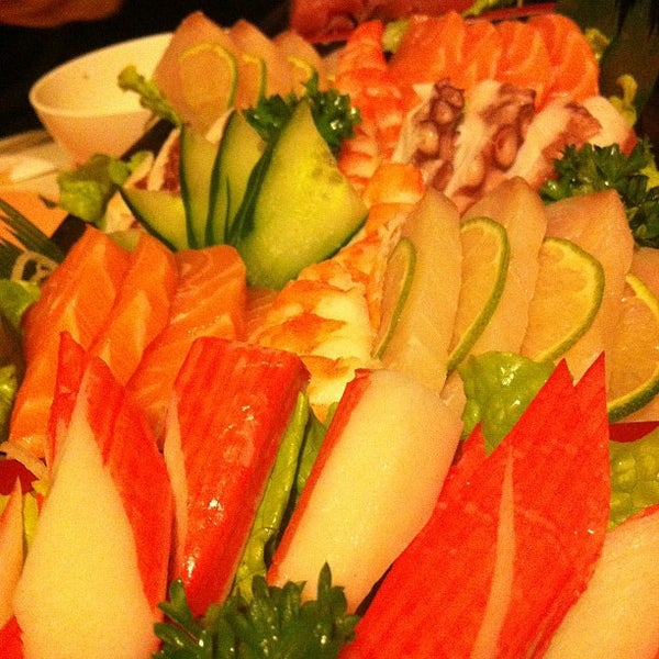 Photo taken at Sushi Garden by Alessandro S. on 5/18/2012