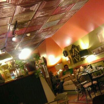 Photo taken at Under The Moon Cafe by Karl on 5/13/2012