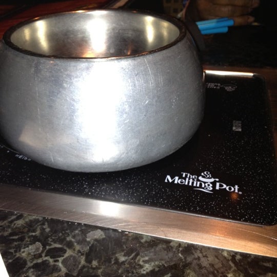 Photo taken at The Melting Pot by Erica D. on 3/22/2012