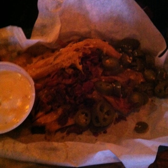 Photo taken at Snuffers by Johnny T. on 6/15/2012