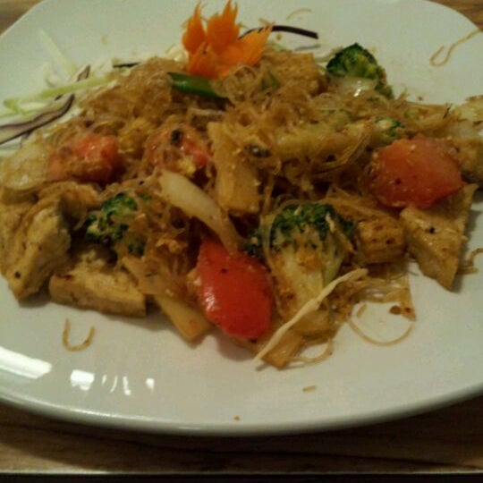 Photo taken at So Thai Restaurant by Rudy B. on 2/12/2012