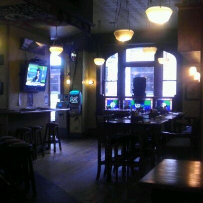 Photo taken at Molly Malone&#39;s Irish Pub &amp; Restaurant by Tristan W. on 2/24/2012