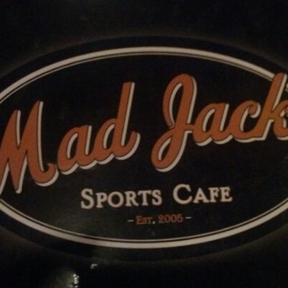 Photo taken at Mad Jacks Sports Cafe by Christopher T. on 7/30/2012