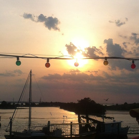 Photo taken at CoCo&#39;s Sunset Grille by Natalie M. on 6/3/2012