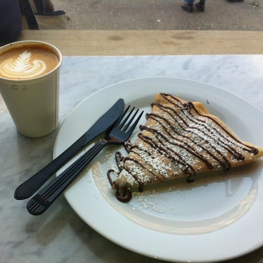 Photo taken at Cusp Crepe and Espresso Bar by R M. on 3/24/2012