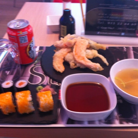 Photo taken at Sushi Store Express by Veronica B. on 4/21/2012