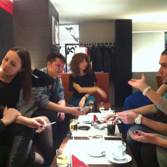Photo taken at EMPORIO ARMANI CAFFE by Dmitry K. on 3/30/2012