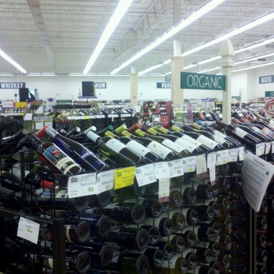 Photo taken at Exit 9 Wine &amp; Liquor Warehouse by Hailey K. on 4/11/2012
