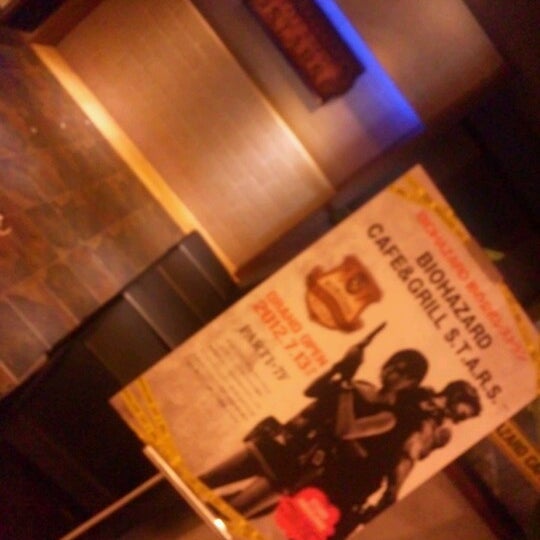 Photo taken at Biohazard Café &amp; Grill S.T.A.R.S. by 猿渡一秀 K. on 7/15/2012