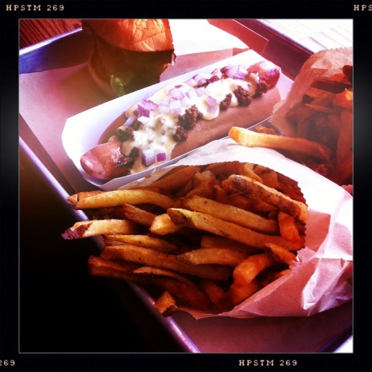 Photo taken at Bark Hot Dogs by Lisa M. on 8/11/2012