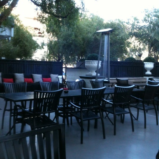 Photo taken at Artisan Hotel Boutique and Lounge by Jodi G. on 3/21/2012