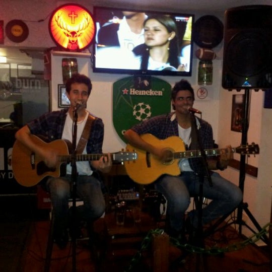 Photo taken at Cervejaria Compadrio by Gustavo C. on 5/24/2012