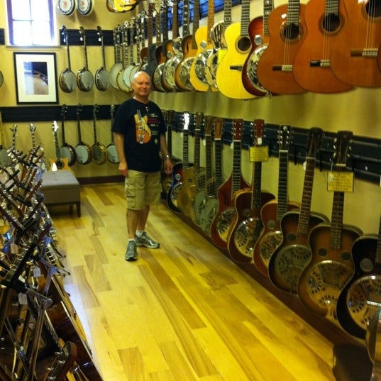 Photo taken at Gruhn Guitars by Luigi C. on 6/13/2012
