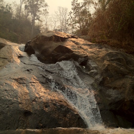 Photo taken at Moh Pang Waterfall by Nattiez F. on 3/18/2012