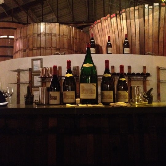 Photo taken at Le Cigare Volant by Thierry L. on 8/26/2012