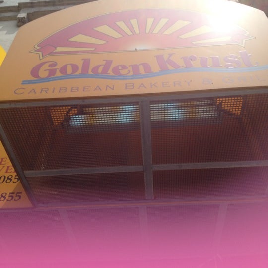 Photo taken at Golden Krust Caribbean Restaurant by Alexie Rae F. on 5/27/2012